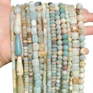 Natural Amazonite stone beads in various shapes including heart, square, and teardrop drop
