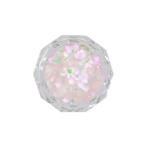 Iridescent pink petal-shaped nail art glitter sequins in octagonal jar