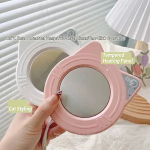 Detail view of cute cat-shaped heating mat with 55 degree constant temperature control