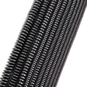 Macro view of natural black hematite saucer beads in various sizes for jewelry making
