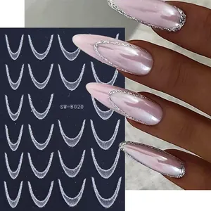 Macro view of silver glitter French smile line nail stickers with application effect