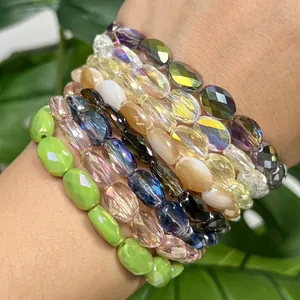 Macro view of 8x11mm faceted oval crystal beads in vibrant multi-colors for DIY jewelry crafts