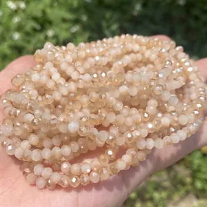 Macro view of faceted beige amber crystal glass beads for DIY jewelry accessories