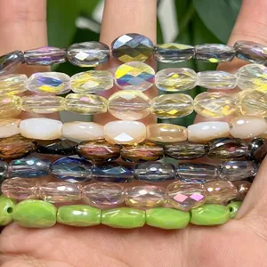 Various strands of multi-color 8x11mm faceted egg-shaped crystal beads for DIY crafts