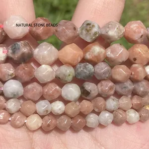 Detailed macro view of faceted peach natural stone beads for DIY jewelry craft