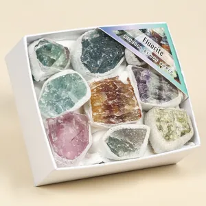 Natural mixed fluorite raw stones and irregular minerals in a white decorative gift box