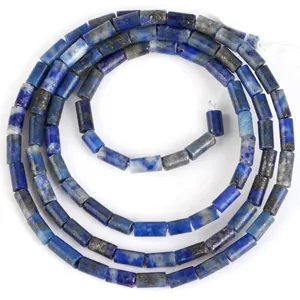 Detailed view of 4x2mm cylindrical natural Lapis Lazuli stone beads for DIY jewelry.