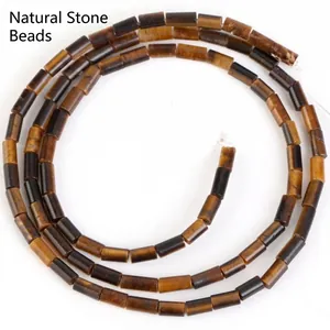Detailed view of 4x2mm cylindrical brown tiger eye stone beads for DIY jewelry making