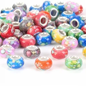 Detailed view of assorted colorful large-hole beads for DIY charm bracelet jewelry making
