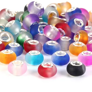 Macro view of colorful frosted large hole beads for DIY charm bracelets and jewelry making