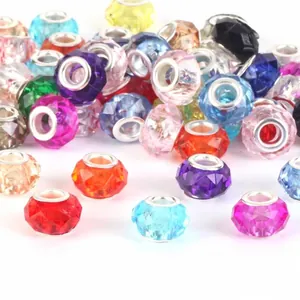 Detailed macro view of mixed colorful faceted glass beads for DIY snake chain bracelets