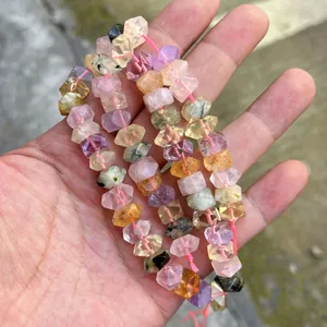Detail shot of faceted natural crystal beads in vibrant candy colors for DIY crafts