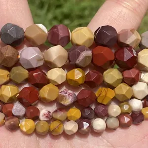 Detailed macro view of faceted multi-colored natural stone beads for DIY jewelry craft