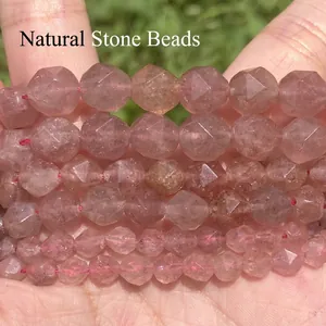 Close-up macro detail of faceted natural pink strawberry quartz stone beads for DIY jewelry