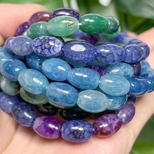 Close-up macro view showing texture of blue dragon vein agate rice beads for DIY jewelry