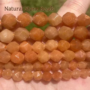 Macro detail of orange faceted natural stone beads for DIY craft jewelry making