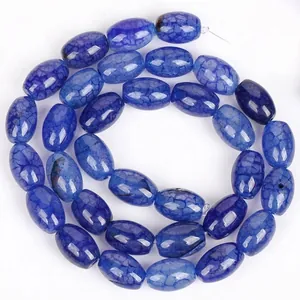 Macro detail of blue dragon vein agate barrel beads for DIY bracelet jewelry making