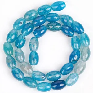 Macro detail of blue dragon vein agate rice beads showing unique internal textures.