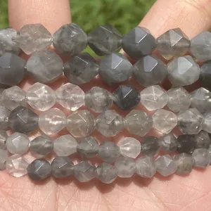 Close-up of faceted grey natural stone beads for DIY jewelry making craft projects