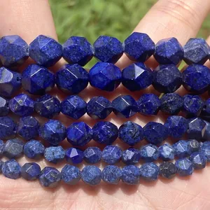 Macro detail of faceted blue lapis lazuli natural stone beads for jewelry making