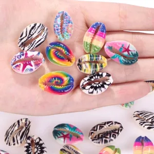 Detailed view of colorful printed cowrie shell beads for DIY jewelry making