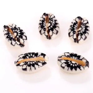 Close-up macro view of natural printed cowrie shell beads for DIY jewelry accessories