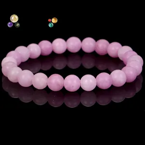 Elegant natural pink quartz gemstone beaded bracelet with a glossy black reflection