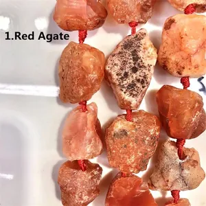Detailed view of natural irregular red agate raw stone beads for jewelry DIY crafts