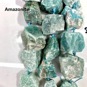 Detailed macro view of natural raw irregular amazonite stone beads for DIY jewelry craft
