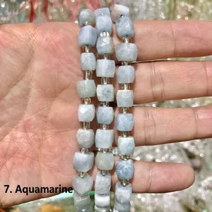Close-up of light blue aquamarine octagonal faceted cube gemstone beads
