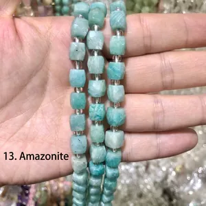 Close-up of natural light blue faceted Amazonite crystal square beads for DIY jewelry.