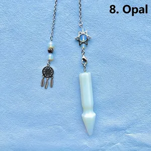 Close-up of opalite hexagonal prism pendulum with dreamcatcher and hexagram charms