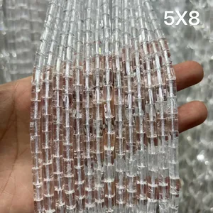 Close-up of 5x8mm natural clear white quartz cylindrical beads for DIY jewelry making