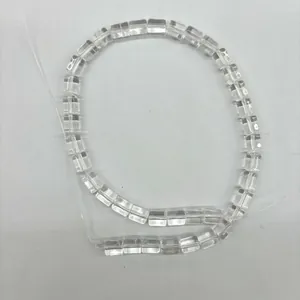 Detail showing high-grade clear Brazilian quartz cylindrical beads for DIY jewelry