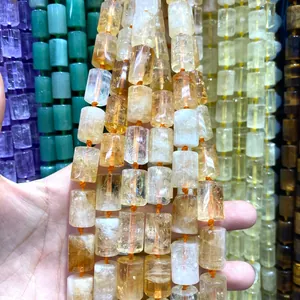 Close-up detail of cylindrical natural crystal beads 12x16mm for DIY jewelry making