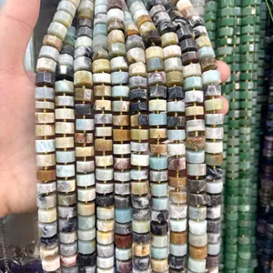 Close-up of faceted abacus-shaped natural stone beads for DIY jewelry making