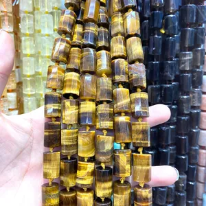 Close-up detail of natural Tiger's Eye cylindrical faceted beads for DIY jewelry