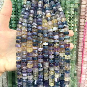 Close-up view of 6x10mm faceted multi-color natural stone abacus beads for DIY jewelry.