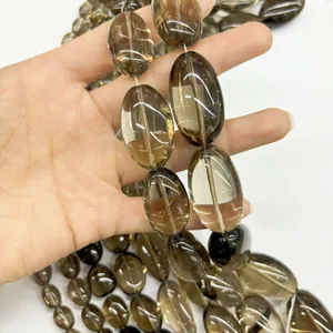 Detailed view of high-quality natural smoky quartz oval beads for DIY jewelry making
