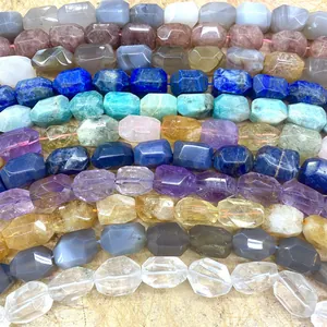 Rows of various faceted natural crystal and gemstone beads for DIY jewelry making accessories