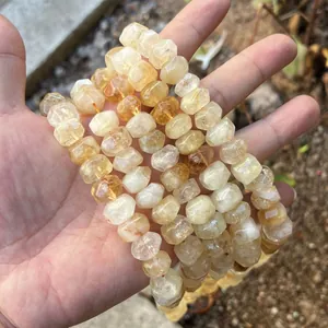 Macro view showing the irregular faceted texture of transparent yellow crystal beads