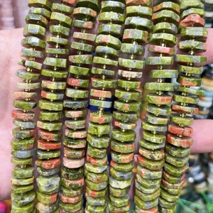 Detailed macro shot of natural Unakite stone abacus beads for DIY jewelry making projects
