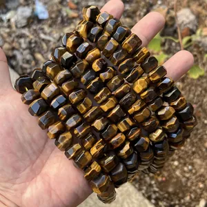 Detailed macro view of faceted natural tiger's eye stone beads for DIY jewelry making