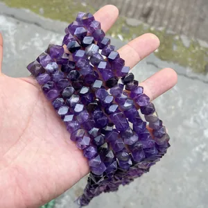 Macro view of natural faceted purple amethyst beads for DIY jewelry making accessories