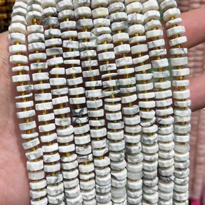 Macro detail view of faceted 4x8mm abacus white stone beads for handmade DIY jewelry components
