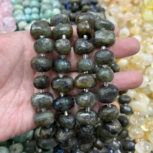 Close-up of faceted oval labradorite gemstone beads for DIY jewelry making
