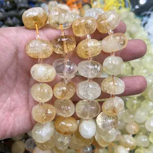 Macro view of faceted natural citrine crystal beads for jewelry making
