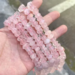 Detailed view of natural rose quartz faceted sugar beads for DIY jewelry making projects