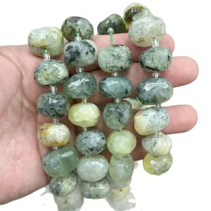 Faceted natural crystal oval beads for DIY jewelry making displayed in hand