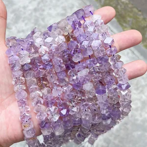 Macro view of faceted natural purple amethyst crystal beads for DIY jewelry making